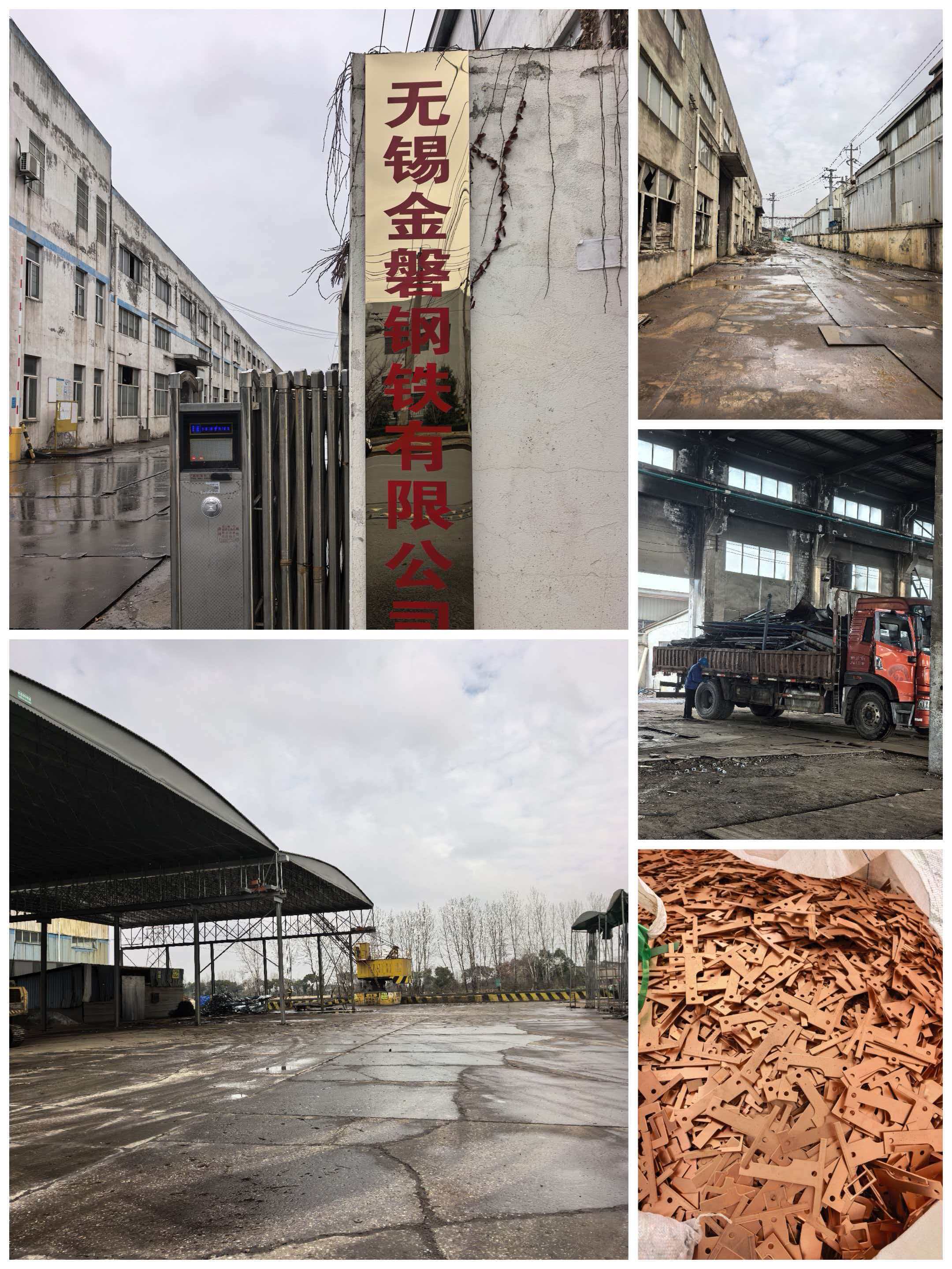 现代化钢铁回收处理车间内部，大型机械设备正在作业，工人身着安全装备进行操作，整体环境整洁有序，体现了专业的企业形象